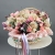 Композиция в корзине "Диодора" из французских роз Квиксенд, диантусов и кустовых пионовидных роз Бомбастик в Москве